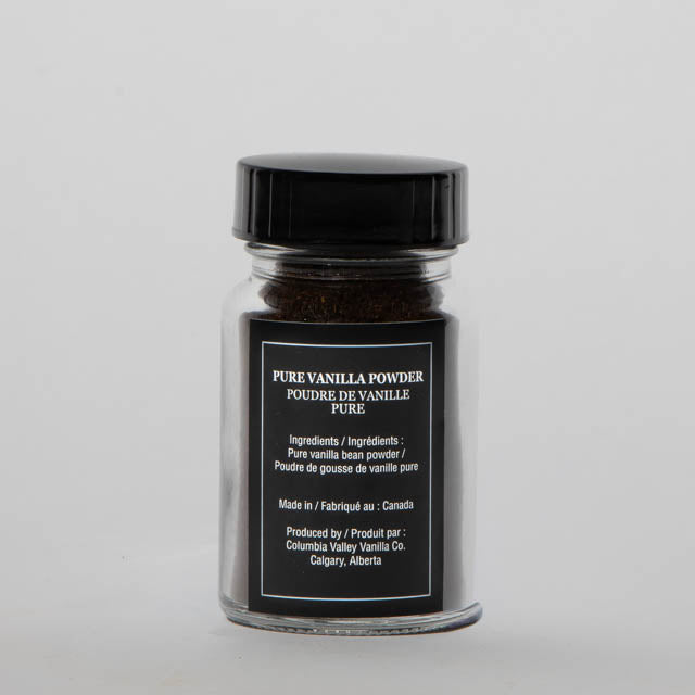 Jar of pure vanilla powder with a black label on a white background